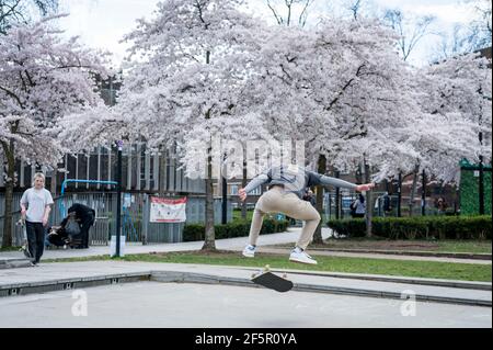 London, UK.  27 March 2021.  UK Weather:  Skateboarders take advantage of a spring day to practice their moves at Swiss Cottage.  The forecast is for much warmer weather on 29 and 30 March, when temperatures are expected to rise above 20C.  Credit: Stephen Chung / Alamy Live News Stock Photo