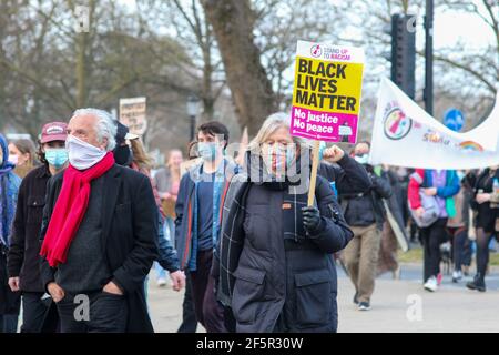 Brighton, UK. 27th Mar, 2021. Protesters gathered in Brighton this evening in protest against the new Police, Crime and courts bill. They then marched onto Brighton police station. Credit: Pete Abel/Alamy Live News