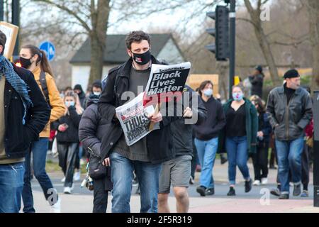 Brighton, UK. 27th Mar, 2021. Protesters gathered in Brighton this evening in protest against the new Police, Crime and courts bill. They then marched onto Brighton police station. Credit: Pete Abel/Alamy Live News