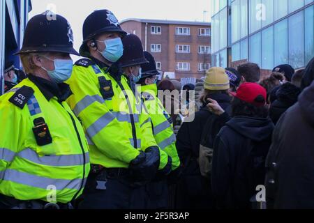 Brighton, UK. 27th Mar, 2021. Protesters gathered in Brighton this evening in protest against the new Police, Crime and courts bill. They then marched onto Brighton police station. Credit: Pete Abel/Alamy Live News