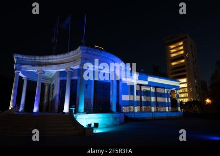 Flag of Greece illuminated in nicosia municipality building during the celebrations of Greek independence day Stock Photo