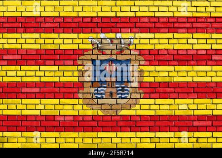 flag of Benidorm painted on brick wall Stock Photo
