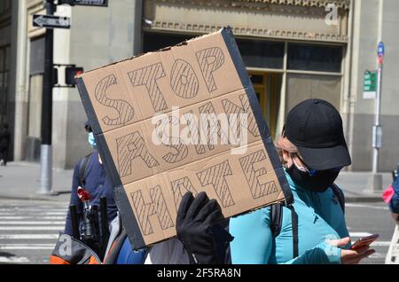 Hundreds of people gathered near NYC City Hall during Stop Asian Hate demonstration to show support to Asian community in New York City on March 27, Stock Photo
