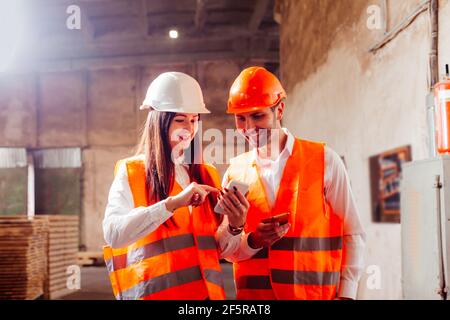 Video chat with engineers and workers discuss production plans Stock Photo