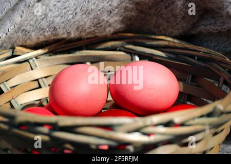 Basket with colorful Easter eggs Stock Photo