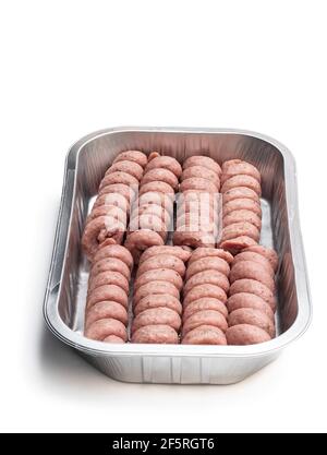 Raw spiral  sausage in foil tray isolated on white Stock Photo