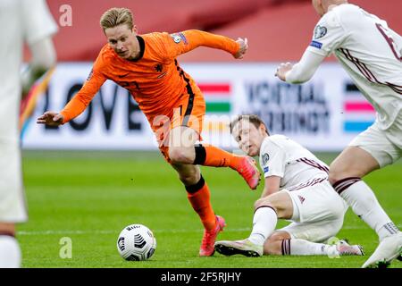 AMSTERDAM, NETHERLANDS - MARCH 27: Janis Ikaunieks of Latvia, Daley Blind  of the Netherlands during the FIFA World Cup 2022 Quatar Qualifier match  bet Stock Photo - Alamy