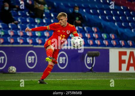 Cardiff, UK. 27th Mar, 2021. Matthew Smith of Wales crosses the ball Football international friendly match, Wales v Mexico, at the Cardiff city stadium in Cardiff, South Wales on Saturday 27th March 2021. Editorial use only. pic by Lewis Mitchell/Andrew Orchard sports photography/Alamy Live News Credit: Andrew Orchard sports photography/Alamy Live News Stock Photo