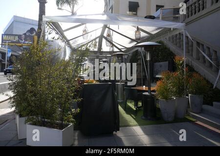 West Hollywood, California, USA 25th March 2021 A general view of atmosphere of outdoor dining with tent and barricades on Sunset Blvd on March 25, 2021 in West Hollywood, California, USA. Photo by Barry King/Alamy Stock Photo Stock Photo