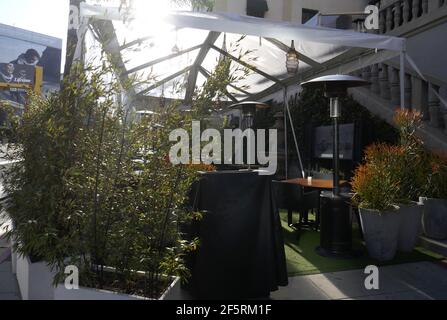 West Hollywood, California, USA 25th March 2021 A general view of atmosphere of outdoor dining with tent and barricades on Sunset Blvd on March 25, 2021 in West Hollywood, California, USA. Photo by Barry King/Alamy Stock Photo Stock Photo