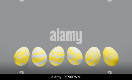 Yellow easter eggs in on gray background, copy space Stock Photo