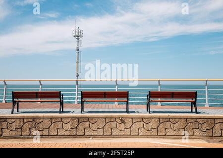 Empty bench and sea at Saemangeum Seawall in Gunsan, Korea Stock Photo
