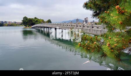 Ohori Park is a pleasant city park in central Fukuoka (Japan) with a large pond at its center. The park was constructed between 1926 and 1929. 04-07-2 Stock Photo