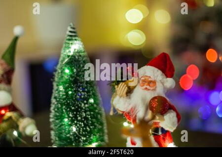 Santa Claus and Christmas tree, greeting card Stock Photo