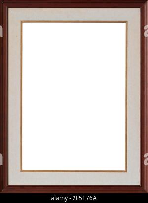 Old vintage wooden frame with white canvas mat and golden molding. Stock Photo