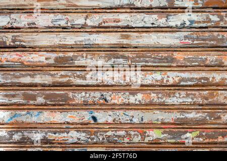Old metallic store blinds with signs of usage Stock Photo