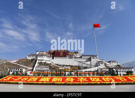 Lhasa, China's Tibet Autonomous Region. 28th Mar, 2021. The square in front of the Potala Palace is decorated to celebrate the Serfs' Emancipation Day in Lhasa, capital of southwest China's Tibet Autonomous Region, March 28, 2021. Credit: Jigme Dorge/Xinhua/Alamy Live News Stock Photo