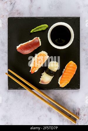 japanese sushi food. Nigiri with tuna, salmon, shrimp. Top view of assorted sushi. Stock Photo