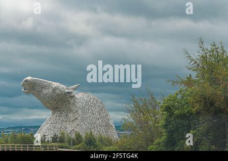 DINBURGH, GREAT BRITAIN - JUNE 03, 2019: horse head sculptures called Kelpies on a cloudy day Stock Photo