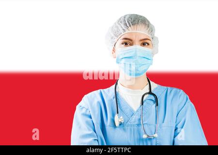 Portrait of a caucasian doctor wearing mask with flag of Poland in background, COVID-19 virus disease crisis, Coronavirus global worldwide pandemic, s Stock Photo