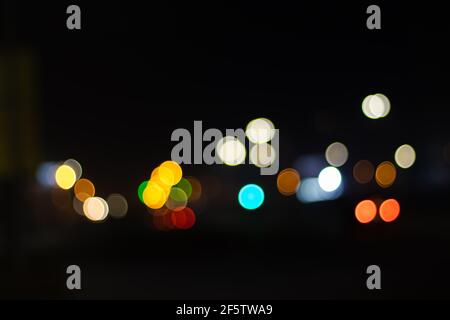 Abstract image of bokeh lights in the city. White, red, orange, blue Stock Photo