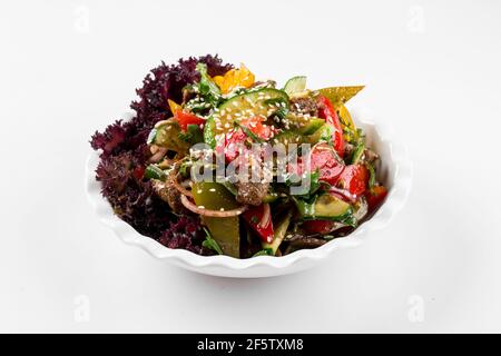 Isolated beef and vegetables salad on the white Stock Photo