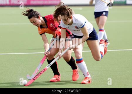 EINDHOVEN, NETHERLANDS - MARCH 28: Marlena Rybacha of Oranje Rood and Mare Agterberg of SCHC during the Women's Hoofdklasse Hockey - 2020/21 Season match between Oranje Rood and SCHC at Genneper Parken on March 28, 2021 in Eindhoven, Netherlands (Photo by Perry van de Leuvert/Orange Pictures) Stock Photo