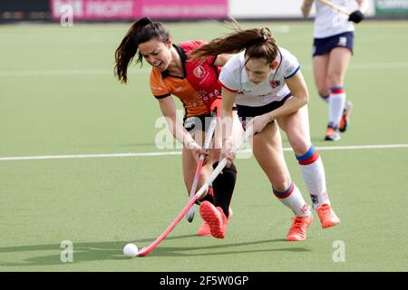 EINDHOVEN, NETHERLANDS - MARCH 28: Marlena Rybacha of Oranje Rood and Mare Agterberg of SCHC during the Women's Hoofdklasse Hockey - 2020/21 Season ma Stock Photo