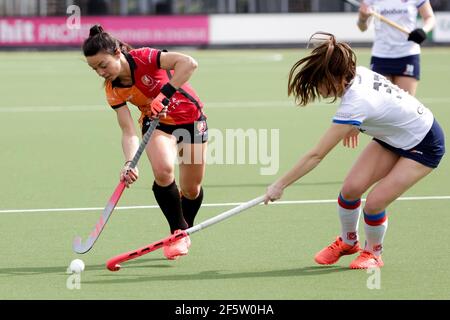 EINDHOVEN, NETHERLANDS - MARCH 28: Marlena Rybacha of Oranje Rood and Mare Agterberg of SCHC during the Women's Hoofdklasse Hockey - 2020/21 Season ma Stock Photo