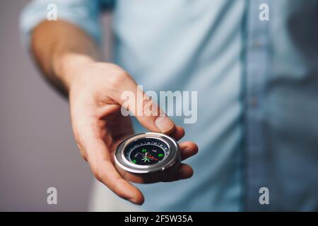 Image of compass in businessman hand Stock Photo