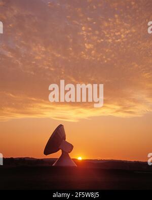 Germany. Bavaria. Raisting Satellite Earth Station.  Parabolic satellite communication antenna at sunset. Stock Photo