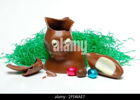 Broken chocolate Easter bunny and chocolate eggs, Easter bunny Stock Photo