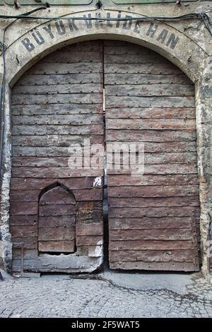 Ancient doorway in Istanbul leads to the historic Büyük Valide Han district Stock Photo