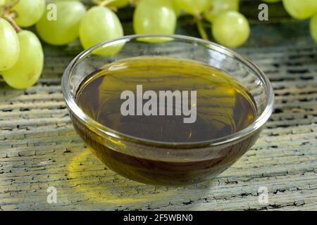 Grape seeds and grape seed oil (Vitis vinifera subsp. vinifera), grape seed oil Stock Photo