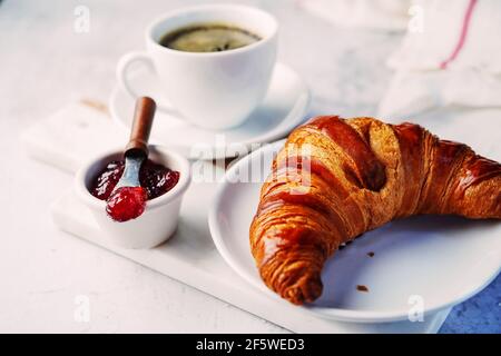 Fresh homemade Croissant served with jam, selective focus Stock Photo