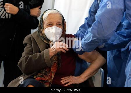 Bucharest, Romania. 28th Mar, 2021. Zoea Baltag, 105-year-old, receives the second shot of COVID-19 vaccine at a hospital in Bucharest, Romania, March 28, 2021. Credit: Cristian Cristel/Xinhua/Alamy Live News Stock Photo