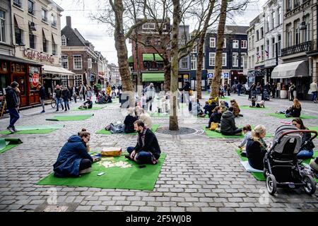 Dozens of catering entrepreneurs, cafe bosses and restaurant owners gather to call attention to the difficult situation in which the catering industry finds itself with a playful picnic due to the mandatory closure as one of the corona measures in Breda, the Netherlands, on March 28, 2021. Photo by Robin Utrecht/ABACAPRESS.COM Stock Photo