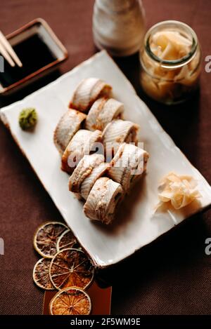Top view of beautifully decorated sushi set on table in restaurant Stock Photo