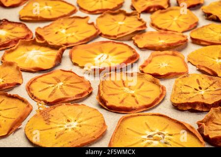 slices of dried persimmon fruit slices - fruit snack Stock Photo