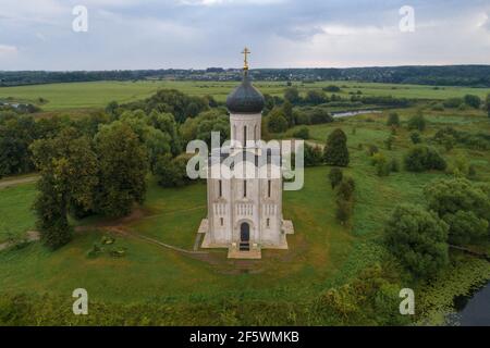 Medieval Church of the Intercession on the Nerl in the August morning (shooting from a quadcopter). Bogolyubovo, Russia Stock Photo