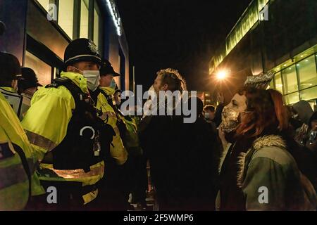 Brighton, UK. 27th Mar, 2021. Protesters confront police officers during the demonstration . Protesters took to the streets of Brighton to voice their opposition to new Police, Crime, Sentencing and Courts Bill being debated in UK Parliament Credit: SOPA Images Limited/Alamy Live News