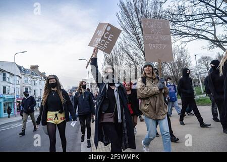Brighton, UK. 27th Mar, 2021. Protesters hold placards during the demonstration. Protesters took to the streets of Brighton to voice their opposition to new Police, Crime, Sentencing and Courts Bill being debated in UK Parliament Credit: SOPA Images Limited/Alamy Live News