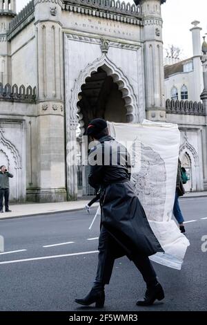 Brighton, UK. 27th Mar, 2021. Protesters hold a banner during the demonstration. Protesters took to the streets of Brighton to voice their opposition to new Police, Crime, Sentencing and Courts Bill being debated in UK Parliament Credit: SOPA Images Limited/Alamy Live News
