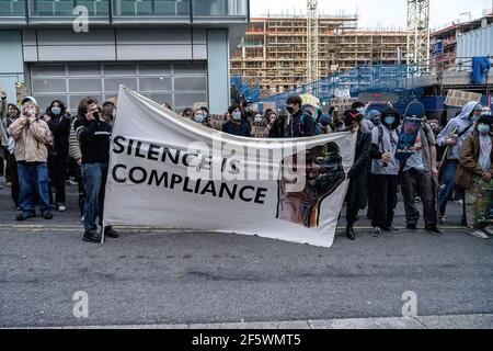 Brighton, UK. 27th Mar, 2021. Protesters hold a banner during the demonstration. Protesters took to the streets of Brighton to voice their opposition to new Police, Crime, Sentencing and Courts Bill being debated in UK Parliament Credit: SOPA Images Limited/Alamy Live News