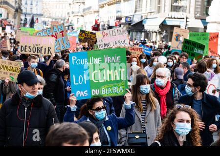 Paris, France. 28th Mar, 2021. Demonstration called by several NGOs and unions for a 'true' law on climate, on March 28, 2021 in Paris, France. Photo by Pierrick Villette/Avenir Pictures/ABACAPRESSS.COM Credit: Abaca Press/Alamy Live News Stock Photo