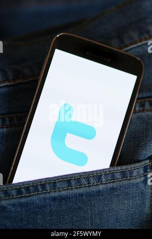 In this photo illustration a Twitter logo seen displayed on a smartphone. Stock Photo