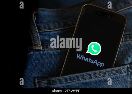 In this photo illustration a Whatsapp online communicator logo seen displayed on a smartphone. Stock Photo