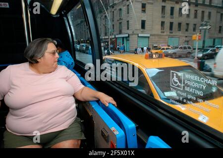 New York, USA. 23rd Aug, 2004. Edith M. Prentiss, President of Manhattan BoroughWide InterAgency Council on Aging Inc, and the M5 bus, in her wheelchair in New York. on August 23, 2004. Prentiss recently died at the age of 69. (Photo by Frances M. Roberts) Credit: Sipa USA/Alamy Live News Stock Photo