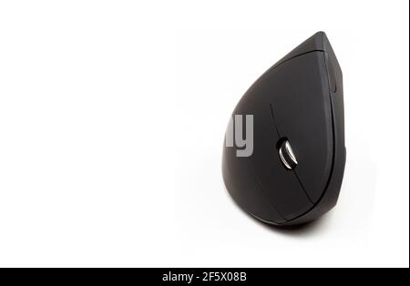 Simple Ergonomic wireless computer mouse, vertical fin design desktop pc mouse object isolated on white. Modern technology for preventing wrist pain a Stock Photo