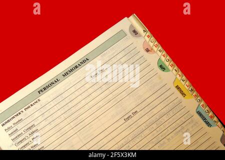A top view of an open diary isolated in the red background Stock Photo